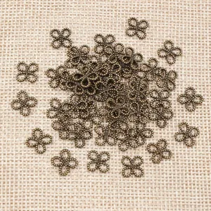 Vintage bronze four-leaf clover mini alloy pendants for DIY jewelry making