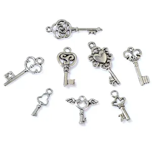 Set of 8 vintage antique silver alloy key charms for DIY jewelry making and crafts