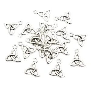 Antique silver Triquetra knot charms for DIY jewelry making on white background