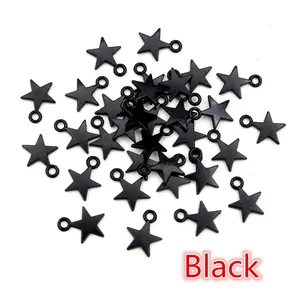 Macro detail of matte black alloy star pendants with closed loops for DIY jewelry
