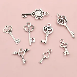 Set of 8 vintage antique silver alloy key pendants for DIY jewelry making and crafts