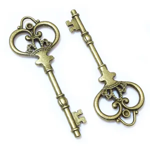 Two vintage bronze crown heart key pendants for DIY jewelry making accessories