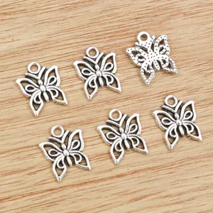 Vintage silver butterfly alloy pendants with hollow wings and textured back for DIY jewelry