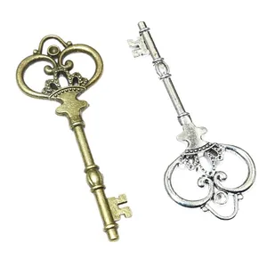 Vintage alloy skeleton key pendants with crown pattern in bronze and silver finishes