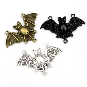 Detailed bat wing alloy pendants in antique bronze, matte black, and silver finishes