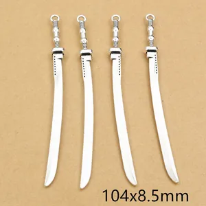 Macro shot of 4 antique silver alloy sword charms with size detail of 104x8.5mm