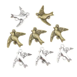 Alloy swallow bird charms in antique bronze and silver finish for DIY jewelry crafting