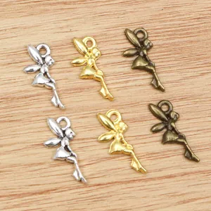 Detailed view of DIY fairy charms in silver, gold, and bronze finishes for jewelry making