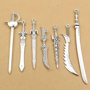Set of seven antique silver alloy sword pendants for DIY jewelry and keychain accessories
