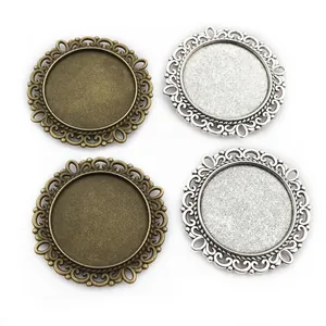 Set of four 25mm round vintage alloy pendant trays in bronze and silver finishes