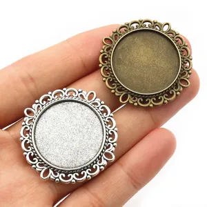 Vintage 25mm double-sided alloy pendant base with hollow lace edges for DIY jewelry crafts