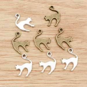 Cat alloy pendants for DIY jewelry making in silver and bronze finish on wood