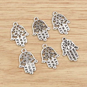 Set of 6 vintage silver Hamsa Hand pendants with intricate hollow patterns for DIY jewelry