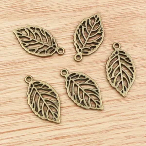 Set of five retro bronze leaf pendants with hollow vein design for DIY jewelry