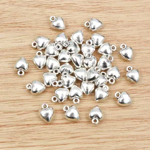 Bulk set of 3D alloy heart-shaped pendants with silver finish for DIY jewelry crafting