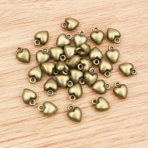 3D heart alloy charms for DIY jewelry making in antique bronze finish with closed ring hooks