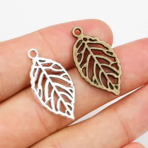 Silver and bronze leaf alloy pendants with hollow carving and top loops for DIY jewelry