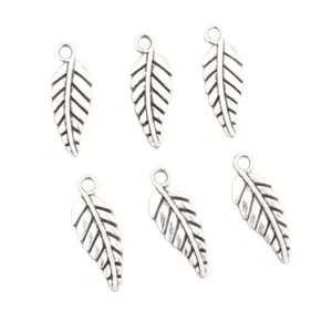 Set of six vintage silver leaf charms with detailed textures for DIY jewelry making