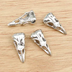 Silver alloy bird skull pendants for DIY jewelry making, set of four detailed charms