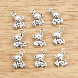 Nine 3D alloy bear pendants for DIY jewelry making in a vintage silver finish