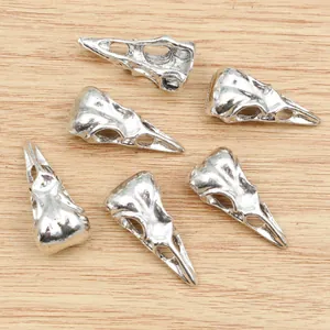 Set of six antique silver bird skull charms made of alloy for DIY jewelry making and crafts