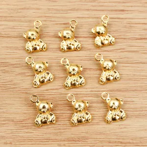 Golden 3D bear alloy charms for DIY necklaces with bright metallic finish and cute bow tie