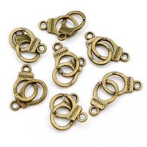 Antique bronze freedom handcuff pendants in alloy for DIY necklaces and jewelry making