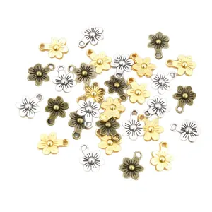 Mini colgantes de flores en aleación oro, plata y bronce para creación de joyas DIY