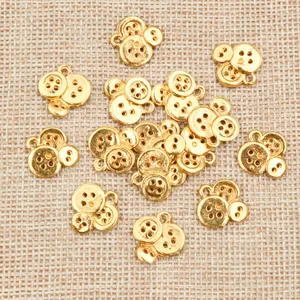 Gouden legering knophangers voor DIY sieraden maken in een verspreide lay-out