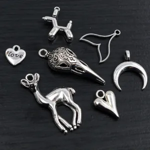 Set of vintage alloy charms including heart, deer and balloon dog for DIY jewelry making