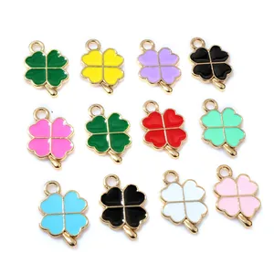 Lot de 12 pendentifs trèfle à quatre feuilles en émail et alliage pour bijoux DIY