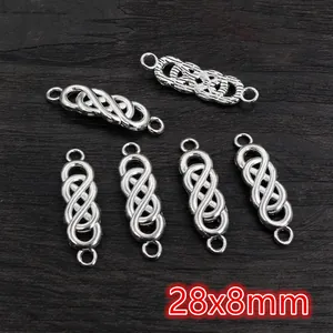 Detail view of 28x8mm silver alloy infinity connector charms for DIY jewelry making
