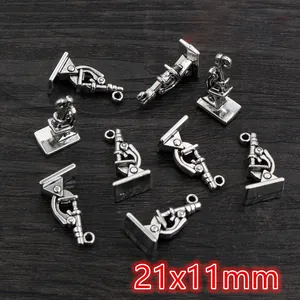Macro shot of 21x11mm antique silver microscope pendants for DIY jewelry making