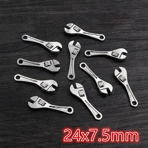 Macro shot of 24x7.5mm antique silver wrench charm for DIY jewelry making accessories