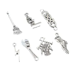 Antique silver alloy charms set including broom, microscope, and wrench for DIY jewelry