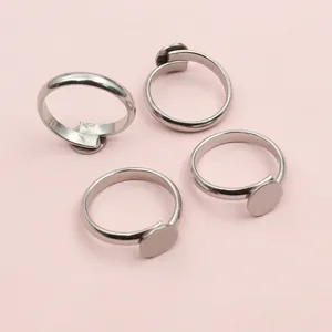 Set of 4 adjustable stainless steel ring blanks with flat round trays for DIY jewelry