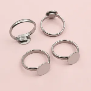 Set of four adjustable stainless steel ring bases with flat trays for DIY jewelry