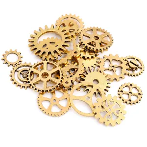 Macro detail of assorted steampunk bronze alloy gears and vintage cog pendants for DIY crafts