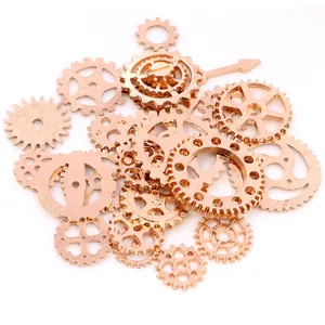 Macro detail of rose gold alloy steampunk gears and vintage clock parts for DIY jewelry