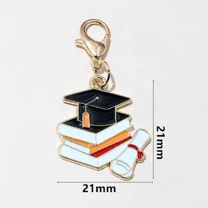 Detail of graduation cap and diploma charm with dimensions 21mm by 21mm