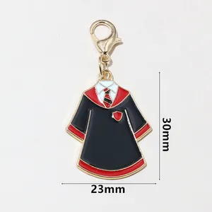Detail showing the 30mm x 23mm wizard school uniform pendant with lobster clasp