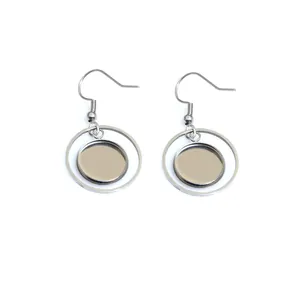 Close-up of silver geometric metal bezel pendant with ear hook for DIY jewelry making