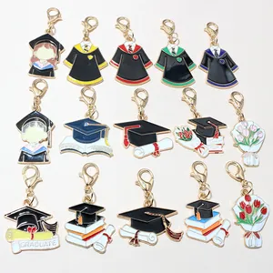 Detail of 15 colorful enamel graduation charms with lobster clasps and gold finish