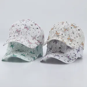Détails de casquettes en dentelle avec strass, motifs papillons et étoiles en métal