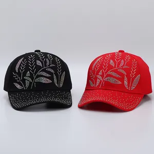 Detailed view of women's cotton baseball caps with luxury rhinestone plant patterns