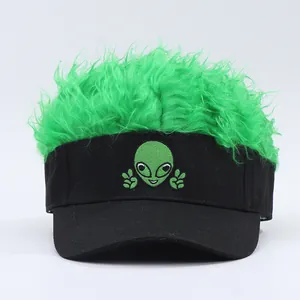 Detailed view of the neon green wig visor hat with embroidered alien peace sign
