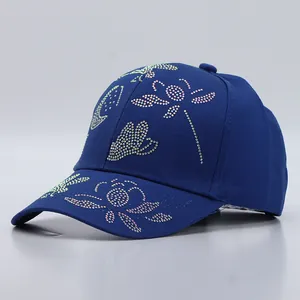 Navy blue cotton baseball cap with colorful rhinestone butterfly and flower patterns