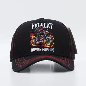 Close-up of motorcycle and flame embroidery on a black breathable trucker cap