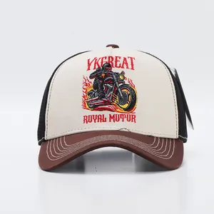 Close-up of heavy embroidery with motorcycle design on trucker hat with mesh back