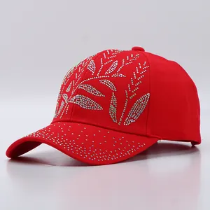 Red cotton baseball cap for women with sparkly silver rhinestone leaf patterns
